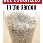 mason jar full of crushed eggshells with text overlay Tips on How to Use Eggshells in the Garden