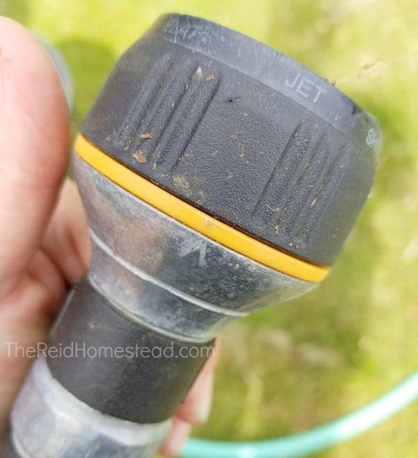close up of my favorite Melnor hose sprayer set on the Jet Spray setting