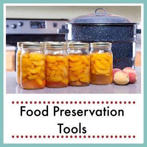 canned peaches on counter by water bath canner with text overlay Food Preservation Tools