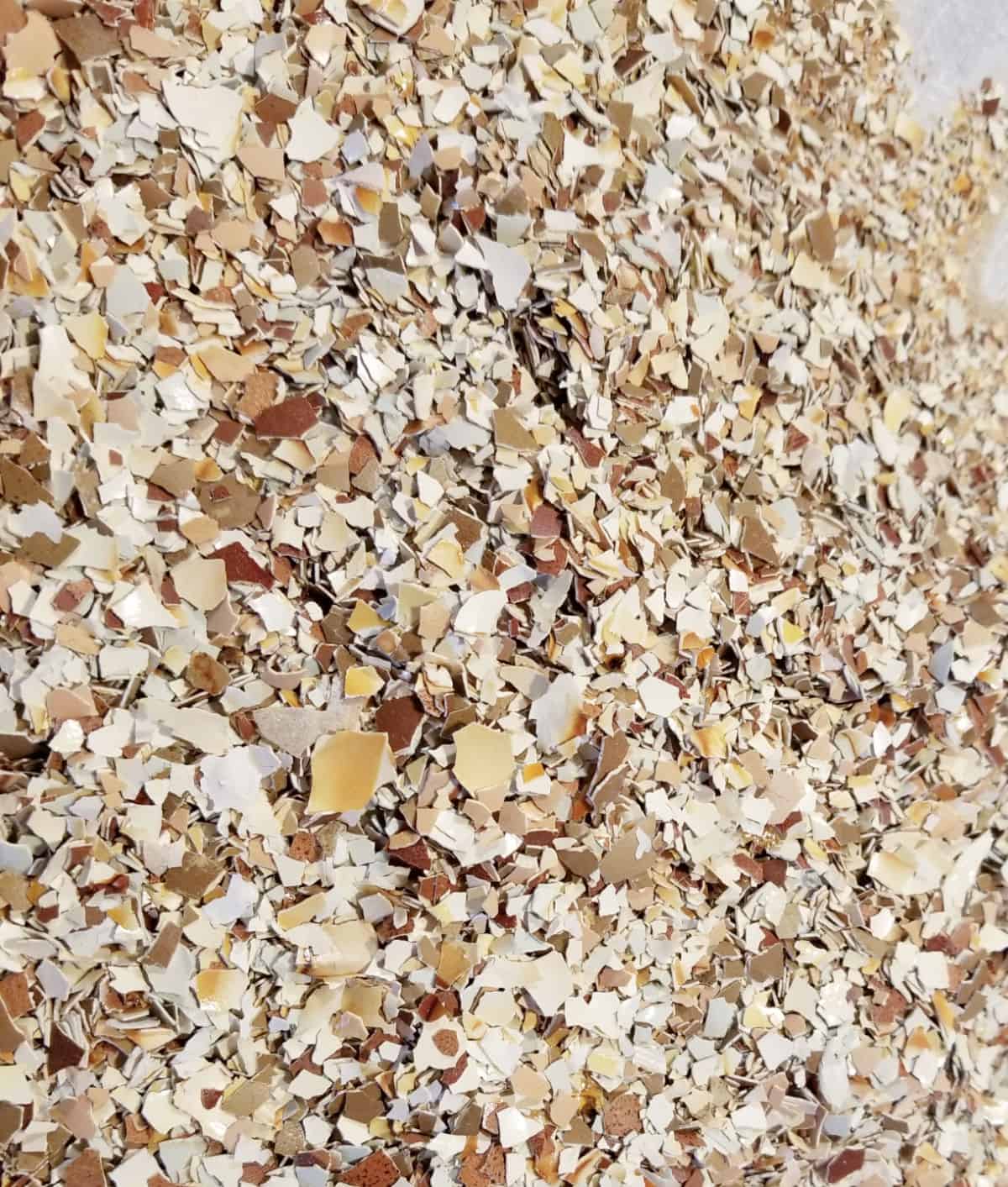 a close up of a pile of crushed eggshells