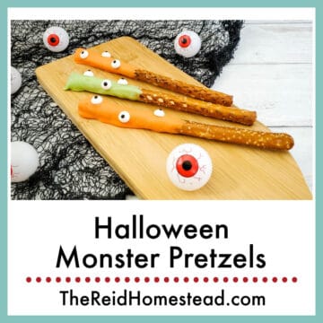 3 monster pretzels on a cutting board with large toy eyeballs near them, text overlay Halloween Monster Pretzels