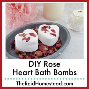 two rose heart bath bombs in a dish with rose petals, text overlay DIY Rose Heart Bath Bombs