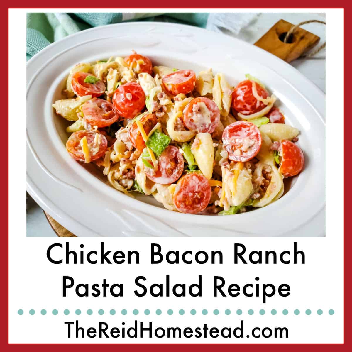 close up of a serving bowl full of chicken bacon ranch pasta salad with text overlay Chicken Bacon Ranch Pasta Salad Recipe